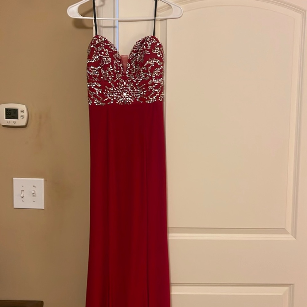 Deep red strapless prom dress with jeweled bodice.